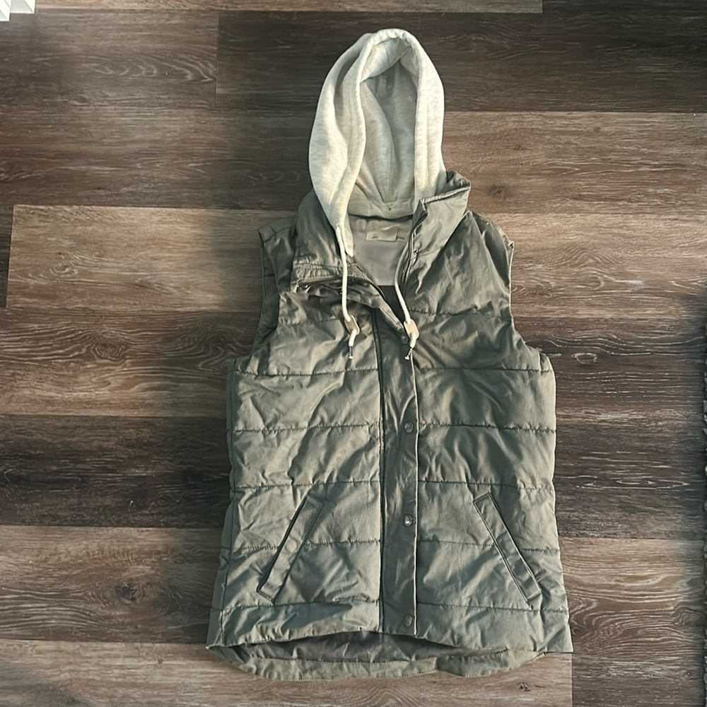 olive green puffy vest with removable hood